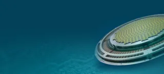 Two fire-fighters combating a blaze